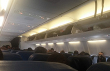 Uçuştan korkan yolcu panik yarattı