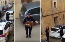 İspanyol polisinden örnek davranış: Halka moral vermek için şarkı söyleyip, dans ettiler