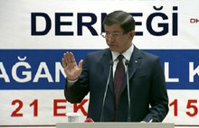 Davutoğlu: Keşke Esad Moskova'da kalsa